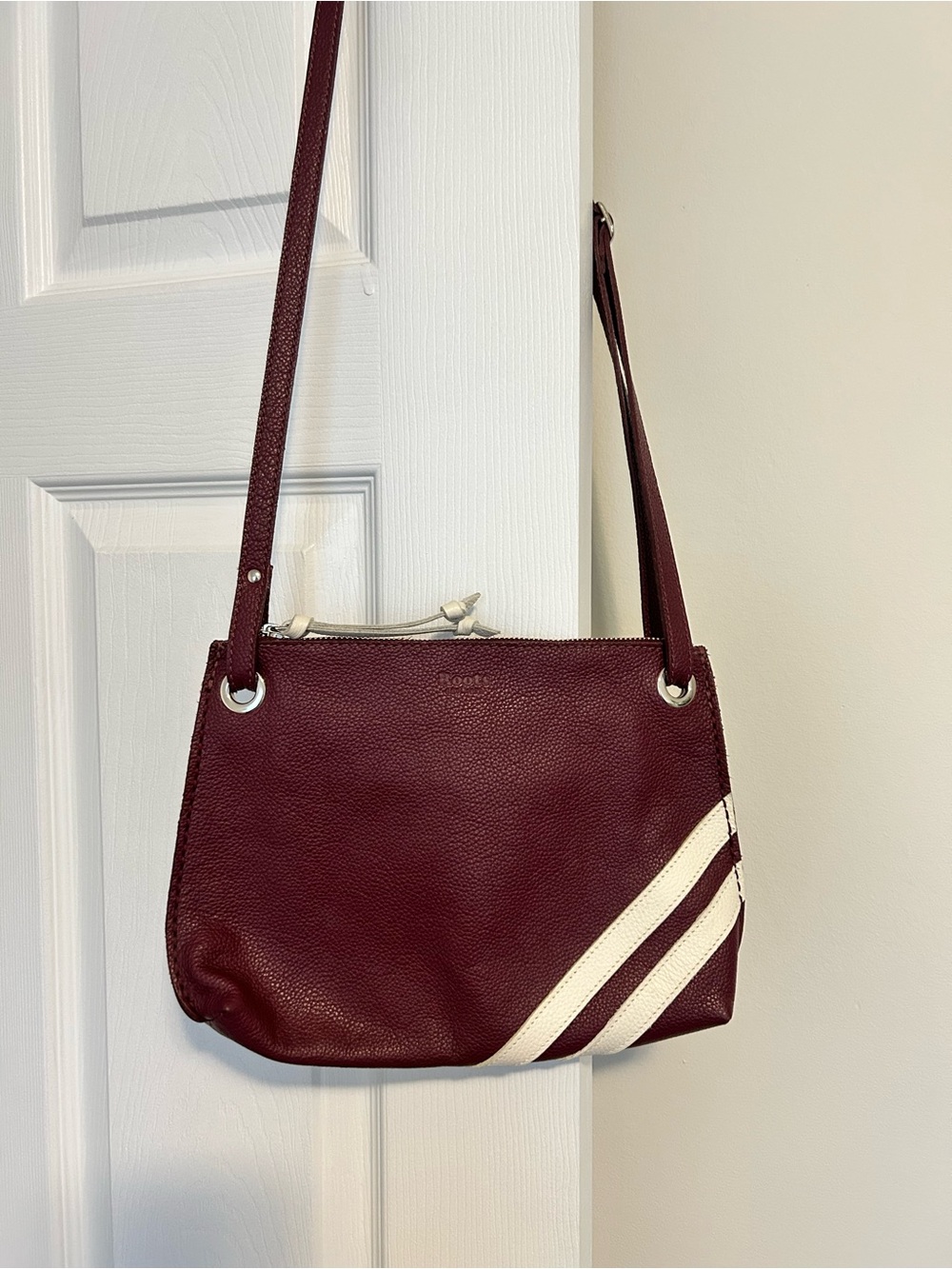 Roots Maroon Crossbody Bag with White Stripe Accents